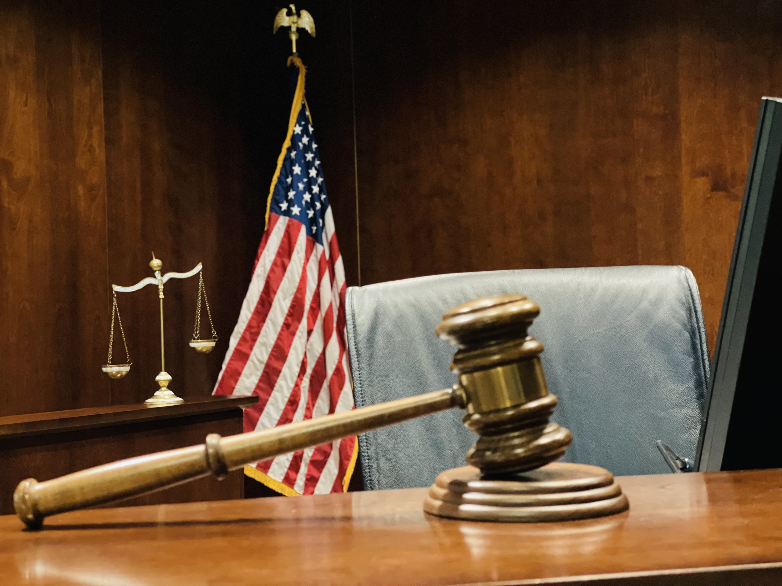 judge-s-wooden-gavel-on-judicial-bench-scales-of-2022-11-07-07-30-47-utc